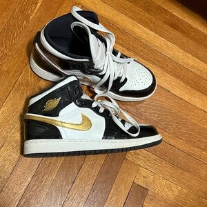 Jordan Kids Black and Gold Sneakers